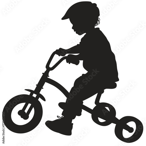 Child riding tricycle silhouette