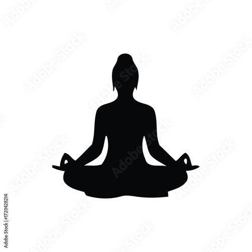 Silhouette of a person meditating in lotus pose, symbolizing inner peace and mindfulness