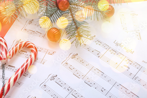Music note sheets with Chri...