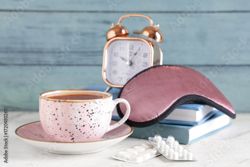 Cup of tea with sleep mask,...