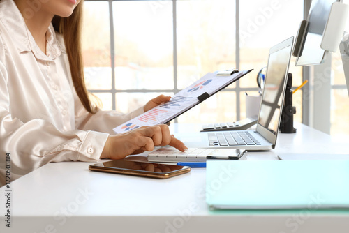 Female accountant working w...