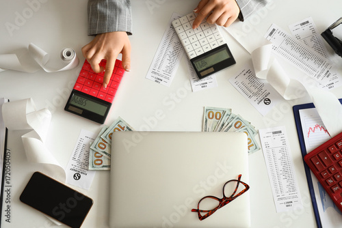 Hands of female accountant ...