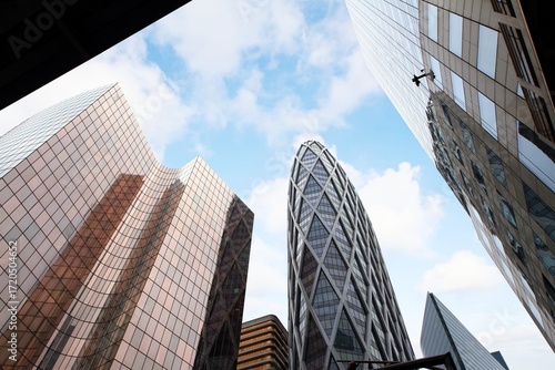 Fotografie Modern skyscrapers and other business buildings with their glass facades in the La Defense district of Paris, France