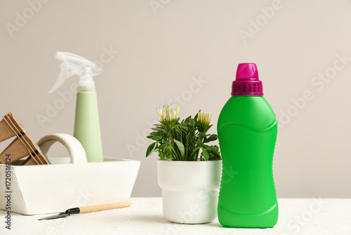 Bottle of plant fertilizer ...