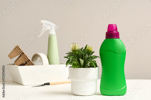 Bottle of plant fertilizer ...