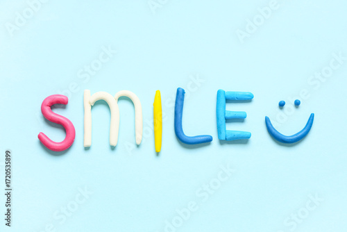 Word SMILE made of play dou...