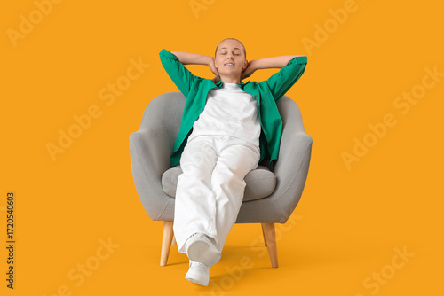 Young woman resting in grey...