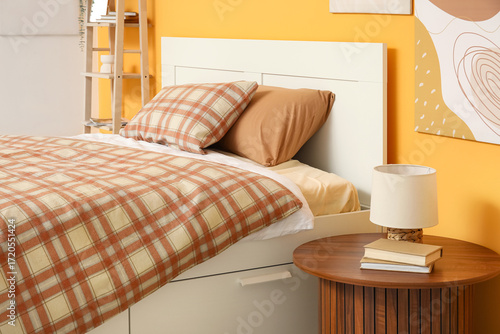 Comfortable bed, table and ...