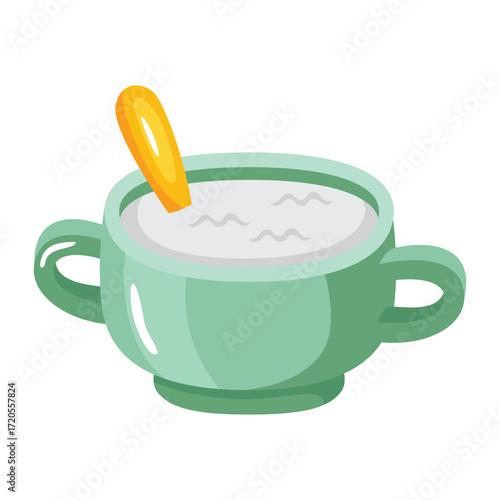A green bowl with a spoon in white liquid
