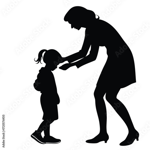 Mother comforting child silhouette