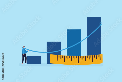 Business growth concept with a person adjusting a tape measure around a rising bar graph