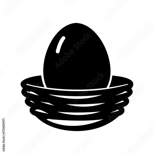 Black and white illustration of an egg nestled in a bird nest