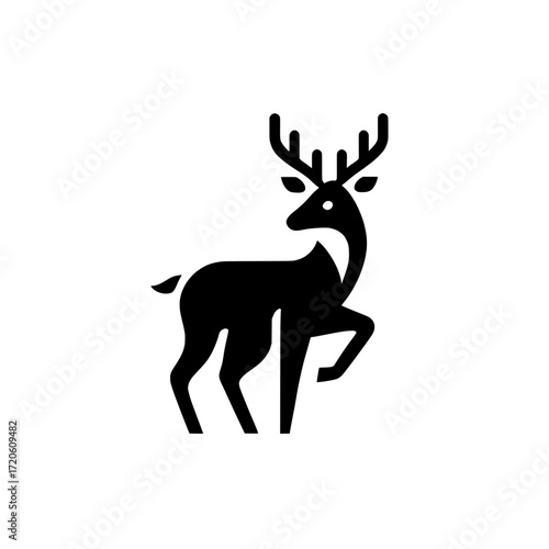 Black vector illustration of a stylized silhouette of a deer standing with one front leg raised.