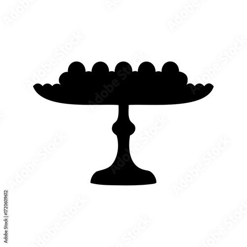 Silhouette of a round footed fruit or cake stand with scalloped edge