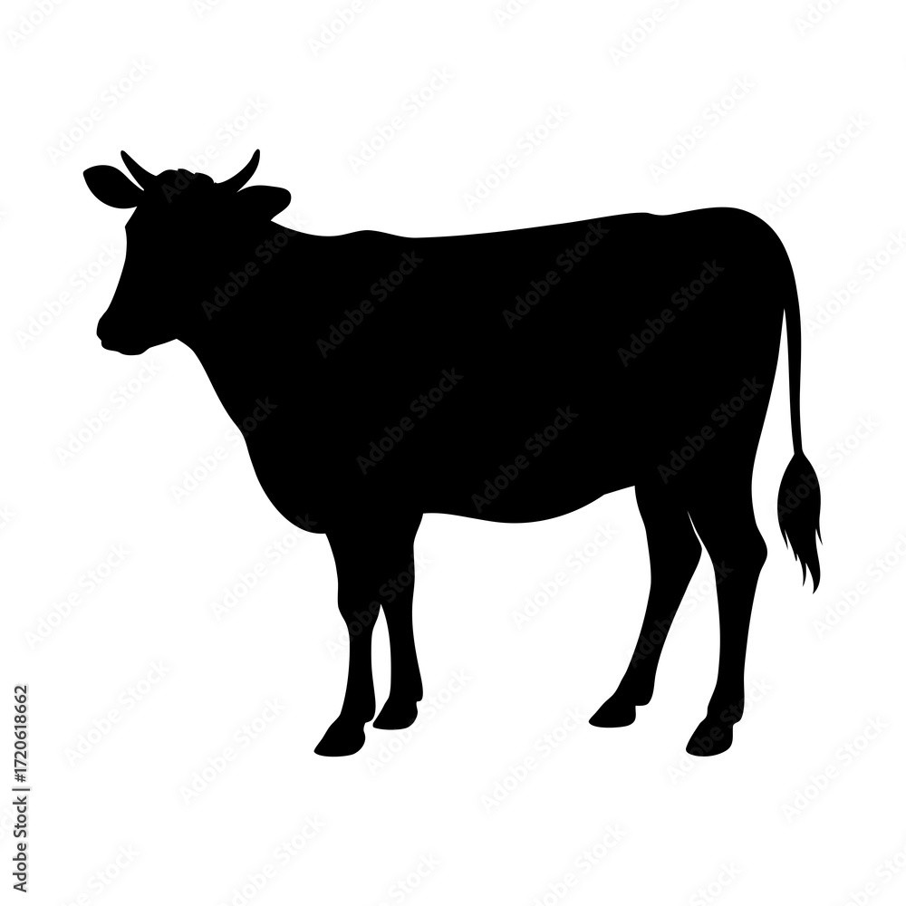 Fototapeta premium Black silhouette of a cow standing on a white background