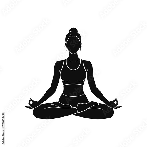 Black silhouette of a woman meditating in a lotus yoga pose, symbolizing peace and mindfulness.