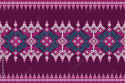 seamless knitted pattern. Symmetrical tribal motif in pink and teal with fine diamond details.