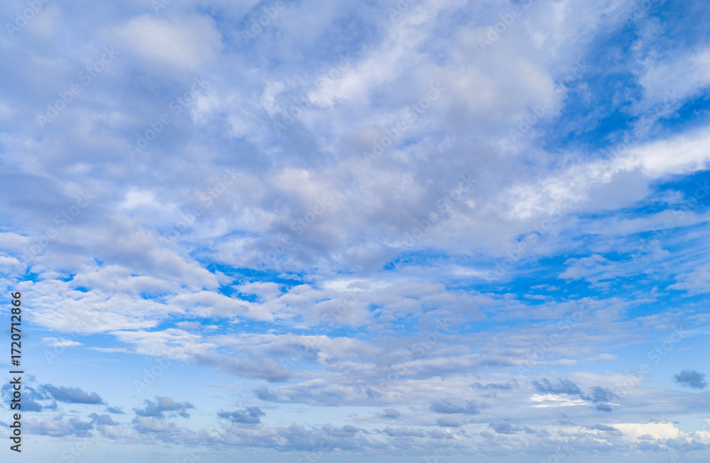 Fototapeta premium Morning sky with cloud. Sky and cloud formation. Weather cloudscape. Sky filled with cloud reflection. Overcast scene. Cloudy sky view. Cloud drifting. Cloudy atmospheric backdrop