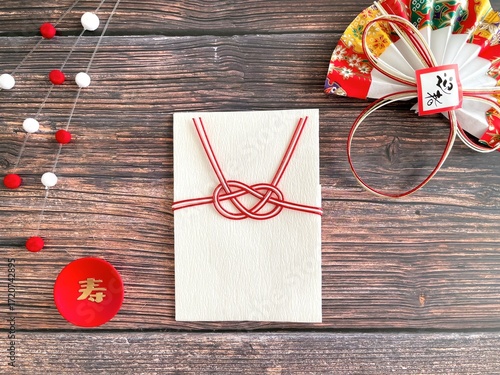 Japanese New Year celebration image with wood grain background