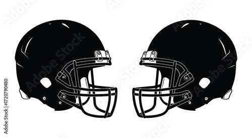Two black american football helmets facing each other iconic sports equipment for teams isolated on white background