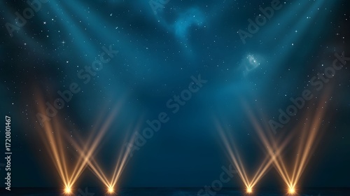 The image displays a dark blue starry sky background with warm spotlights shining upwards from the bottom, creating a magical or theatrical ambiance.