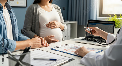 Pregnant Couple at Doctor's Office for Prenatal Consultation
