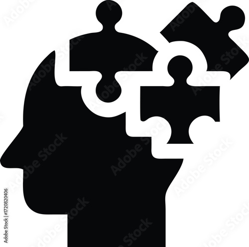Man's head silhouette made of puzzle pieces represents a creative business solution