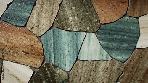 Stone Tile Surface with Irregular Shapes in Earth Tones and Blue Accents
