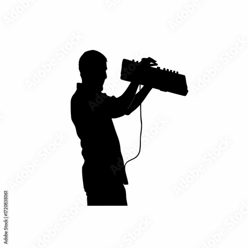 Silhouette of a technician repairing a computer keyboard connection