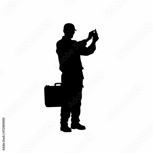Silhouette of a technician inserting a usb drive for testing on a white background silhouette