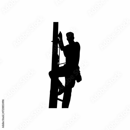 Silhouette of a worker fixing outdoor internet cables on a pole