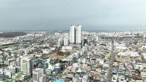 A panoramic view of Cheongju-si, Korea, and an urban aviation view with apartments and government offices
