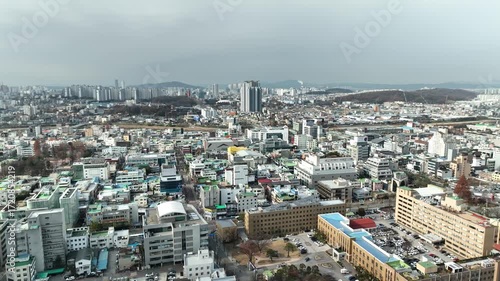 A panoramic view of Cheongju-si, Korea, and an urban aviation view with apartments and government offices