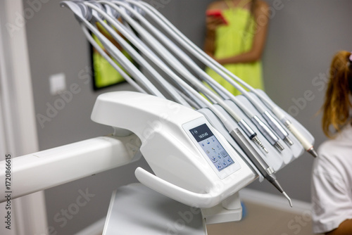 Advanced dental tools await patient care in a modern clinic during a bright afternoon