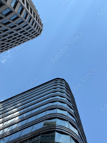 Wallpaper Mural modern glass and concrete buildings against the sky, copy space Torontodigital.ca