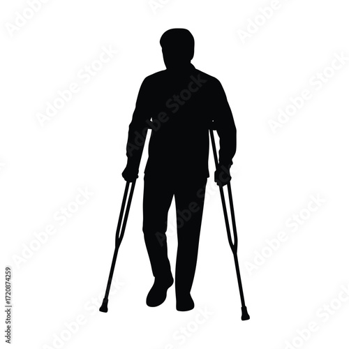 Silhouette of a man walking with crutches