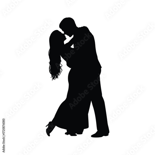 Silhouette of a couple dancing romantically