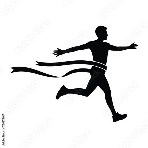 Runner breaking through the finish line tape
