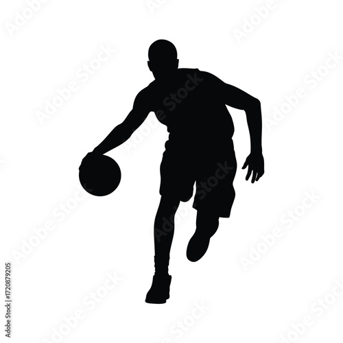 Silhouette of a basketball player dribbling the ball