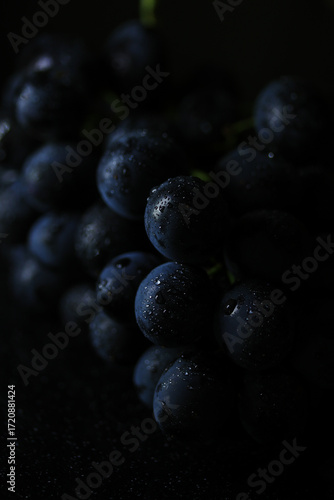 Fresh black grapes close up, organic fruit, healthy food