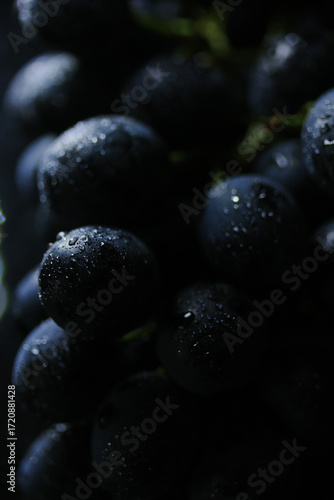 Fresh black grapes close up, organic fruit, healthy food