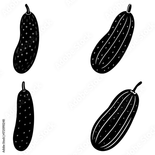 Four black and white cucumbers displayed in a square format with varying textures and orientations