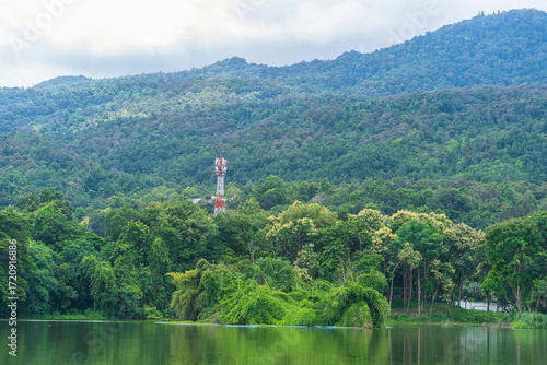 a public place leisure travel landscape lake views at Ang Kaew Chiang Mai University and Doi Suthep nature forest Mountain views spring cloudy sky background with white cloud.