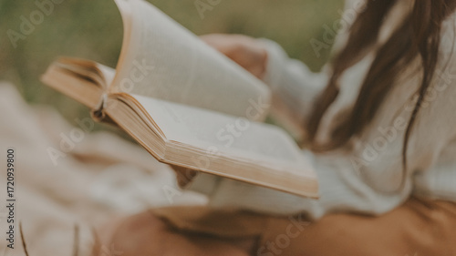 Photos Reading a book outdoors