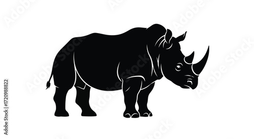 Silhouette of a rhinoceros, showcasing its powerful form