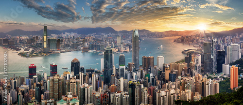 Hong Kong skyline at dramatic sunrise, Victoria harbour