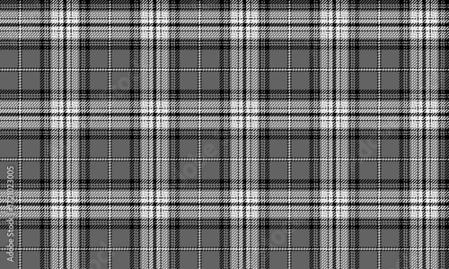 Seamless plaid pattern in dark grey, black, and white tones. Simple, cool, and classic. Perfect for textiles, shirts, skirts, and fashion clothing that require a sleek, contemporary look.