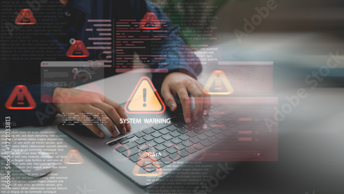 Photos Hands typing on laptop with virtual system warning alerts, symbolizing cybersecurity threats, hacking risk, malware infection, error messages, and digital data protection issues in computer systems