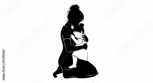 Silhouette of a mother kneeling and embracing her baby, a tender moment of love and care.