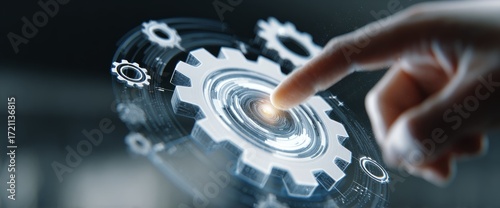 Technological Advancement: A futuristic image depicting a person's hand interacting with a complex digital gear mechanism, representing innovation and progress.